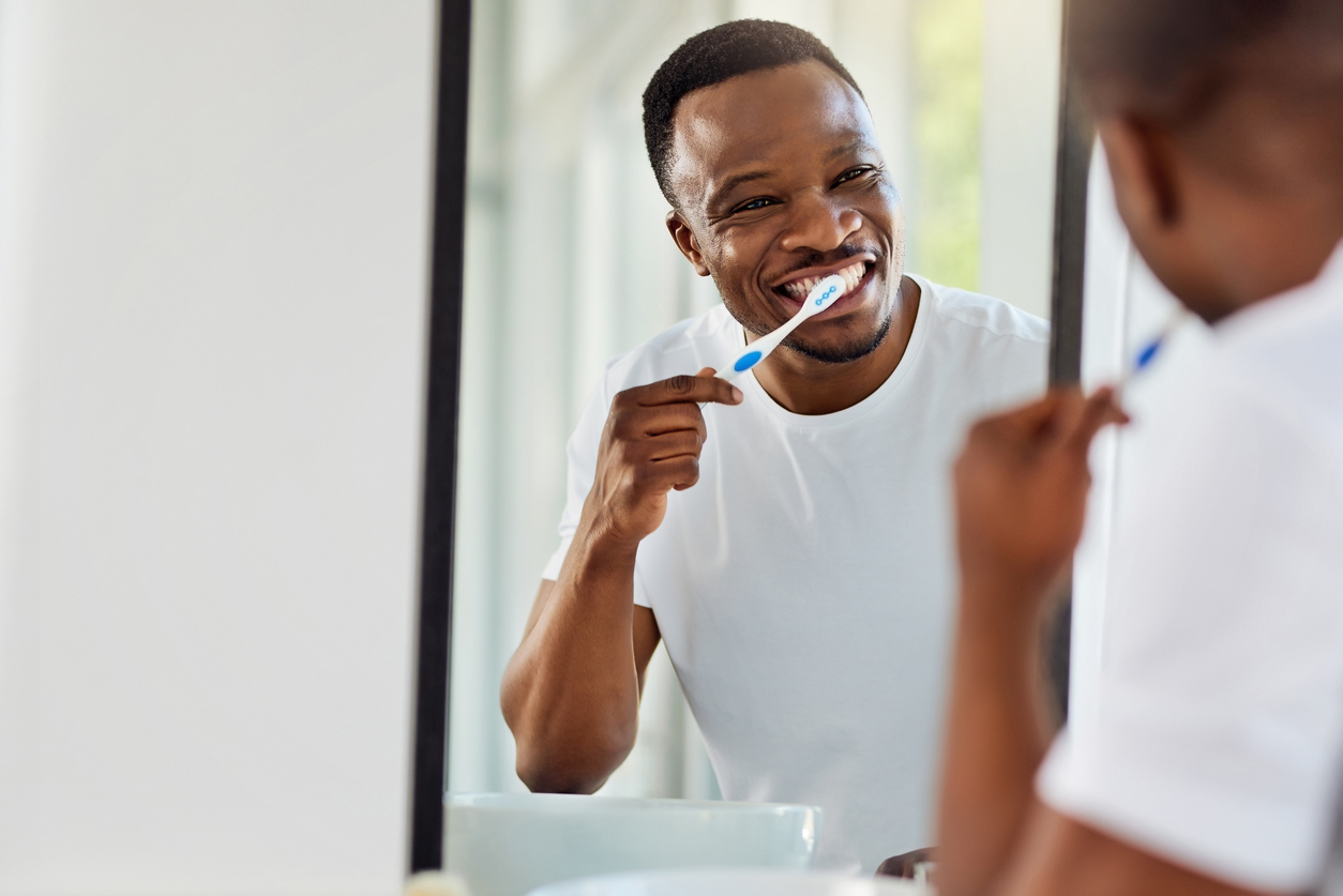 Man Brushing Teeth